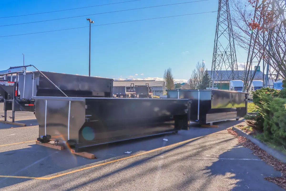 Roll-off dumpster ready for waste disposal at job site for 3 Yard Dumpster Rental in Kinnelon